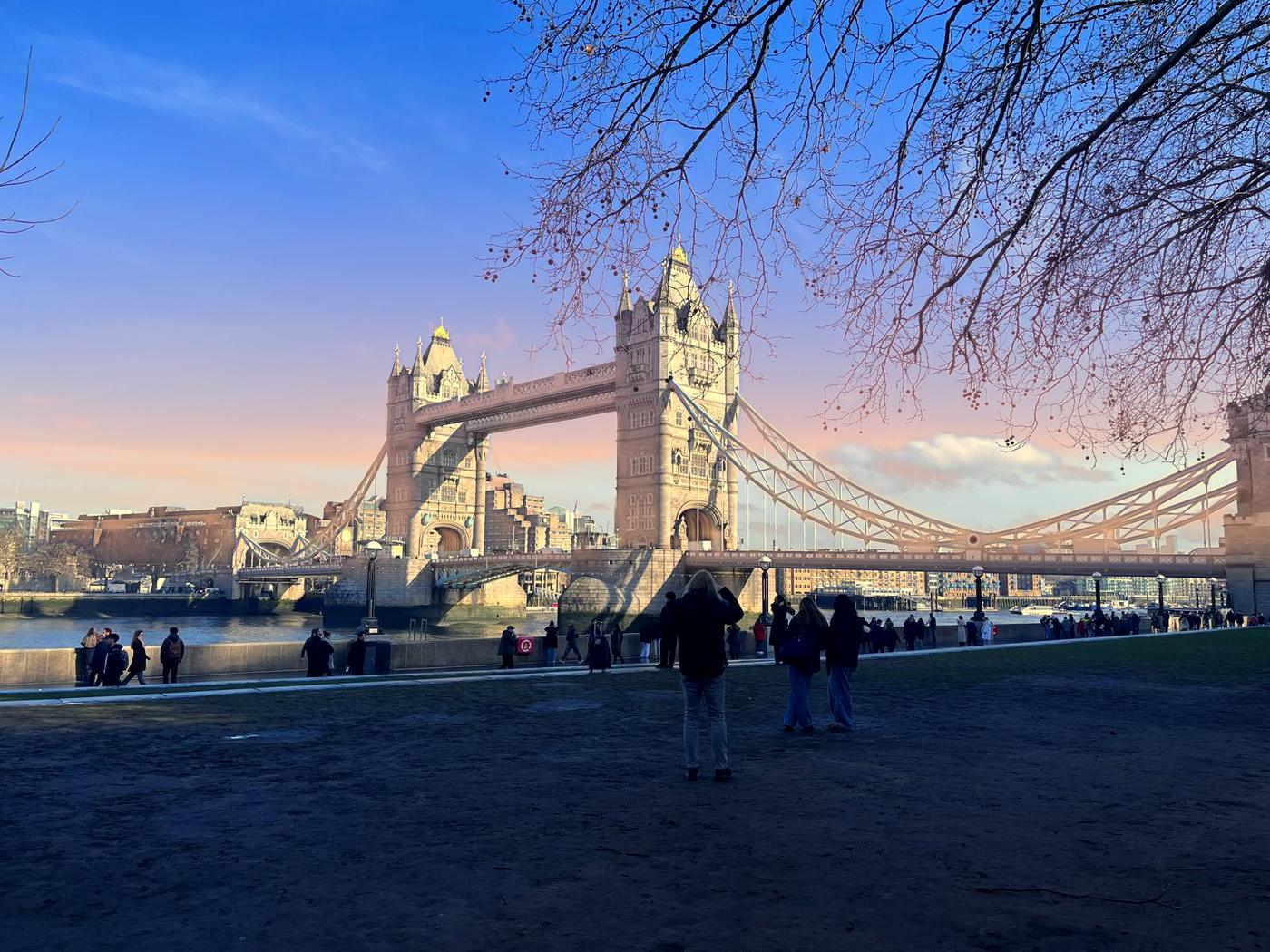Tower Bridge seen from the riverside path at sunset